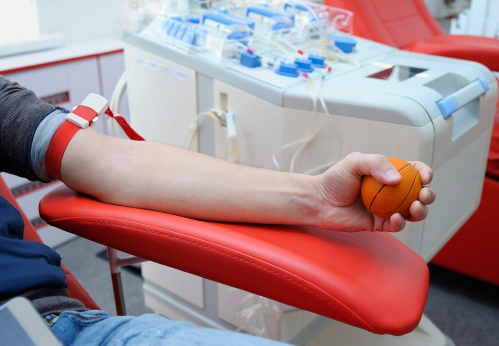 Arm pressing the ball for better blood pressure Preparing for taking blood The leading medical courier service, providing same-day delivery of specimens, medications, and medical equipment for labs, hospital groups, and home health.